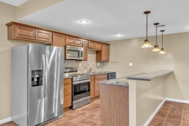 Welcome to this stunning 6-bedroom, 5.1-bathroom estate offering on Golf Club of Creekmoor in Missouri - for sale on GolfHomes.com, golf home, golf lot