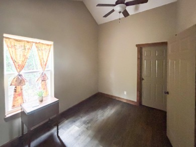 This 3 bedroom, 3 bath home sits on 6 lots in Country Club Hills on Lost Woods Golf Course in Missouri - for sale on GolfHomes.com, golf home, golf lot