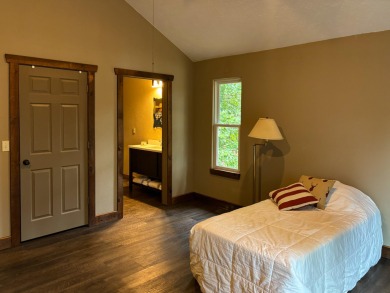 This 3 bedroom, 3 bath home sits on 6 lots in Country Club Hills on Lost Woods Golf Course in Missouri - for sale on GolfHomes.com, golf home, golf lot