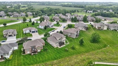 Welcome to this stunning 6-bedroom, 5.1-bathroom estate offering on Golf Club of Creekmoor in Missouri - for sale on GolfHomes.com, golf home, golf lot