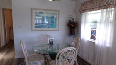 Charming 2-Bedroom PH Home  - Almost Fully Furnished & Golf Cart on Schalamar Creek Golf and Country Club in Florida - for sale on GolfHomes.com, golf home, golf lot