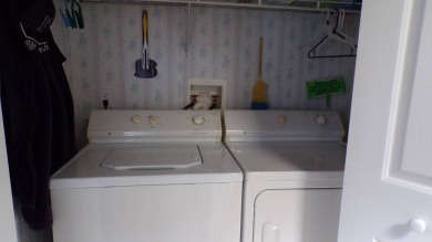 Charming 2-Bedroom PH Home  - Almost Fully Furnished & Golf Cart on Schalamar Creek Golf and Country Club in Florida - for sale on GolfHomes.com, golf home, golf lot