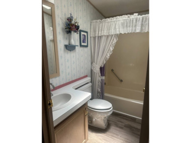Charming 2-Bedroom PH Home  - Almost Fully Furnished & Golf Cart on Schalamar Creek Golf and Country Club in Florida - for sale on GolfHomes.com, golf home, golf lot