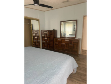 Charming 2-Bedroom PH Home  - Almost Fully Furnished & Golf Cart on Schalamar Creek Golf and Country Club in Florida - for sale on GolfHomes.com, golf home, golf lot