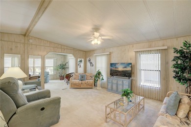 Furnished beauty just steps from the golf course! This on Barefoot Bay Golf Course in Florida - for sale on GolfHomes.com, golf home, golf lot