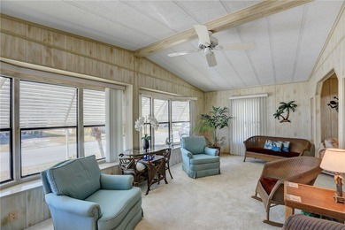 Furnished beauty just steps from the golf course! This on Barefoot Bay Golf Course in Florida - for sale on GolfHomes.com, golf home, golf lot