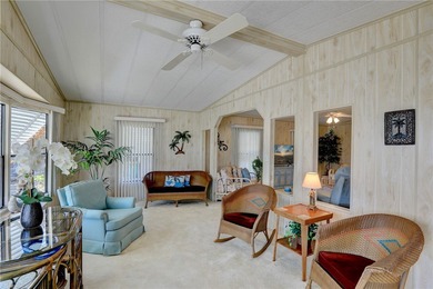 Furnished beauty just steps from the golf course! This on Barefoot Bay Golf Course in Florida - for sale on GolfHomes.com, golf home, golf lot
