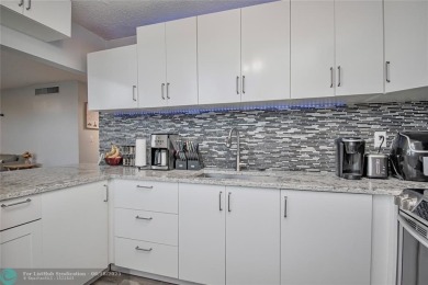 Welcome to resort style living in this completely renovated on Pine Island Ridge Country Club in Florida - for sale on GolfHomes.com, golf home, golf lot