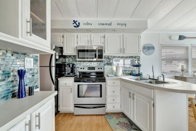 Welcome to The Salty Mermaid, a charming 2-bedroom, 1-bathroom on Island Dunes Country Club in Florida - for sale on GolfHomes.com, golf home, golf lot
