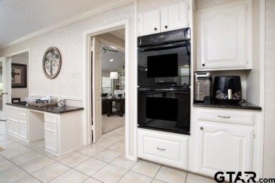 Prepare to be impressed! Nestled behind the private gates of the on Emerald Bay Club in Texas - for sale on GolfHomes.com, golf home, golf lot