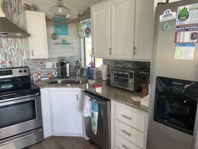 TIRED OF SNOW, ICE AND COLD, MIGHT BE TIME TO START THINKING SUN on Pine Lakes Country Club in Florida - for sale on GolfHomes.com, golf home, golf lot