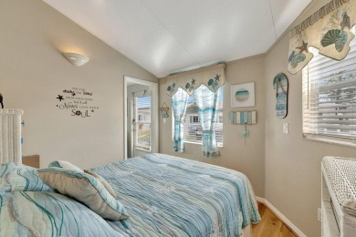 Welcome to The Salty Mermaid, a charming 2-bedroom, 1-bathroom on Island Dunes Country Club in Florida - for sale on GolfHomes.com, golf home, golf lot