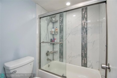 Welcome to resort style living in this completely renovated on Pine Island Ridge Country Club in Florida - for sale on GolfHomes.com, golf home, golf lot