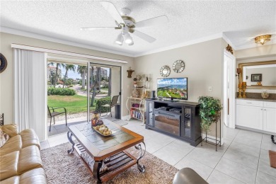 This ground-floor, 2-bedroom, 2-bath condo in Isla Del Sol on Isla Del Sol Yacht and Country Club in Florida - for sale on GolfHomes.com, golf home, golf lot
