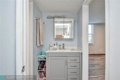 Welcome to resort style living in this completely renovated on Pine Island Ridge Country Club in Florida - for sale on GolfHomes.com, golf home, golf lot