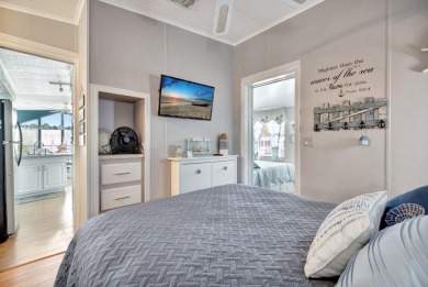 Welcome to The Salty Mermaid, a charming 2-bedroom, 1-bathroom on Island Dunes Country Club in Florida - for sale on GolfHomes.com, golf home, golf lot