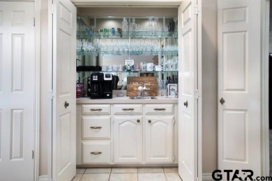 Prepare to be impressed! Nestled behind the private gates of the on Emerald Bay Club in Texas - for sale on GolfHomes.com, golf home, golf lot