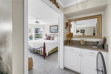 This ground-floor, 2-bedroom, 2-bath condo in Isla Del Sol on Isla Del Sol Yacht and Country Club in Florida - for sale on GolfHomes.com, golf home, golf lot