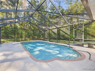 Beautiful Pool Home in Rainbow Springs Country Club Nestled in on Rainbow Springs Golf and Country Club in Florida - for sale on GolfHomes.com, golf home, golf lot