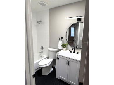GREAT LOCATION!  THIS BEAUTIFULLY, COMPLETELY UPDATED 3bed 2bath on Rocky Point Golf Course in Florida - for sale on GolfHomes.com, golf home, golf lot