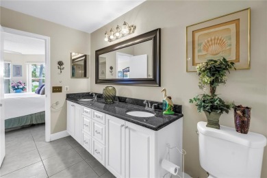 This ground-floor, 2-bedroom, 2-bath condo in Isla Del Sol on Isla Del Sol Yacht and Country Club in Florida - for sale on GolfHomes.com, golf home, golf lot
