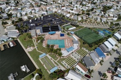 Welcome to The Salty Mermaid, a charming 2-bedroom, 1-bathroom on Island Dunes Country Club in Florida - for sale on GolfHomes.com, golf home, golf lot