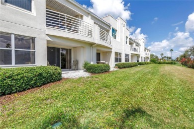 This ground-floor, 2-bedroom, 2-bath condo in Isla Del Sol on Isla Del Sol Yacht and Country Club in Florida - for sale on GolfHomes.com, golf home, golf lot