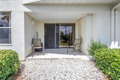 This ground-floor, 2-bedroom, 2-bath condo in Isla Del Sol on Isla Del Sol Yacht and Country Club in Florida - for sale on GolfHomes.com, golf home, golf lot