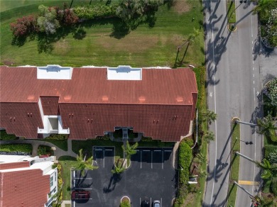 This ground-floor, 2-bedroom, 2-bath condo in Isla Del Sol on Isla Del Sol Yacht and Country Club in Florida - for sale on GolfHomes.com, golf home, golf lot