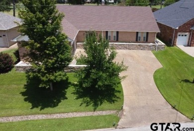 Prepare to be impressed! Nestled behind the private gates of the on Emerald Bay Club in Texas - for sale on GolfHomes.com, golf home, golf lot