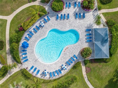 This ground-floor, 2-bedroom, 2-bath condo in Isla Del Sol on Isla Del Sol Yacht and Country Club in Florida - for sale on GolfHomes.com, golf home, golf lot