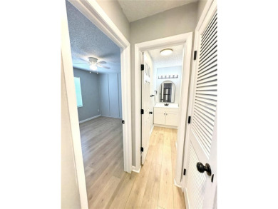 GREAT LOCATION!  THIS BEAUTIFULLY, COMPLETELY UPDATED 3bed 2bath on Rocky Point Golf Course in Florida - for sale on GolfHomes.com, golf home, golf lot