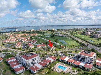 This ground-floor, 2-bedroom, 2-bath condo in Isla Del Sol on Isla Del Sol Yacht and Country Club in Florida - for sale on GolfHomes.com, golf home, golf lot