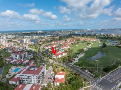 This ground-floor, 2-bedroom, 2-bath condo in Isla Del Sol on Isla Del Sol Yacht and Country Club in Florida - for sale on GolfHomes.com, golf home, golf lot