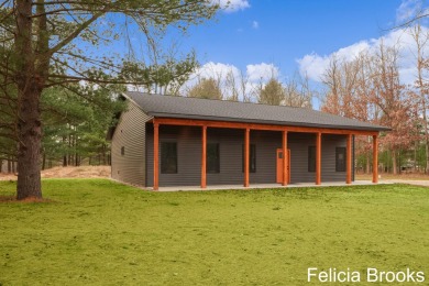 Welcome home to this recently completed bardominium style home - on Tullymore Golf Club in Michigan - for sale on GolfHomes.com, golf home, golf lot