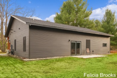 Welcome home to this recently completed bardominium style home - on Tullymore Golf Club in Michigan - for sale on GolfHomes.com, golf home, golf lot