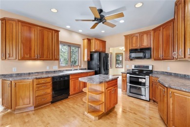 Enjoy scenic views of Mill Run Golf Course from this bright and on Mill Run Golf Course in Wisconsin - for sale on GolfHomes.com, golf home, golf lot