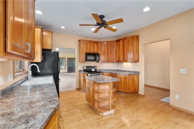 Enjoy scenic views of Mill Run Golf Course from this bright and on Mill Run Golf Course in Wisconsin - for sale on GolfHomes.com, golf home, golf lot