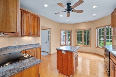 Enjoy scenic views of Mill Run Golf Course from this bright and on Mill Run Golf Course in Wisconsin - for sale on GolfHomes.com, golf home, golf lot