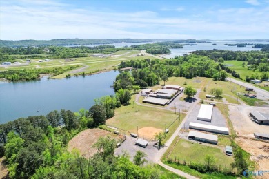 Prime 20-acre waterfront property w/ approx. 2700 feet of main on Gunters Landing in Alabama - for sale on GolfHomes.com, golf home, golf lot