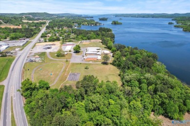 Prime 20-acre waterfront property w/ approx. 2700 feet of main on Gunters Landing in Alabama - for sale on GolfHomes.com, golf home, golf lot