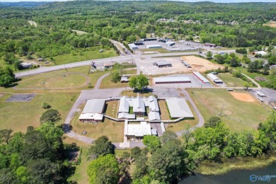 Prime 20-acre waterfront property w/ approx. 2700 feet of main on Gunters Landing in Alabama - for sale on GolfHomes.com, golf home, golf lot