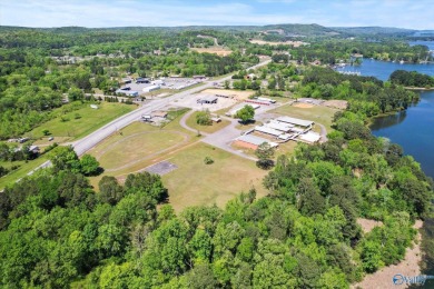 Prime 20-acre waterfront property w/ approx. 2700 feet of main on Gunters Landing in Alabama - for sale on GolfHomes.com, golf home, golf lot