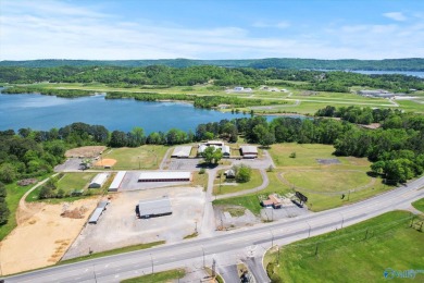 Prime 20-acre waterfront property w/ approx. 2700 feet of main on Gunters Landing in Alabama - for sale on GolfHomes.com, golf home, golf lot