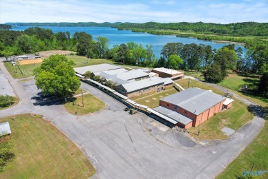 Prime 20-acre waterfront property w/ approx. 2700 feet of main on Gunters Landing in Alabama - for sale on GolfHomes.com, golf home, golf lot