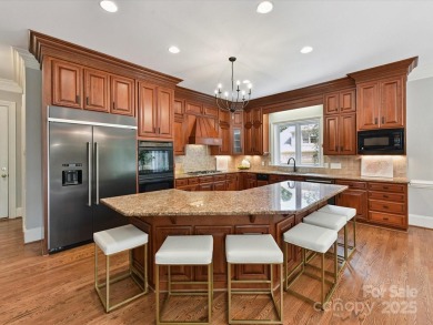 Discover the epitome of luxury living in this stunning executive on Ballantyne Resort and Country Club in North Carolina - for sale on GolfHomes.com, golf home, golf lot
