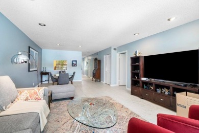 FULLY UPGRADED WATERFRONT FIRST FLOOR UNIT IN SOUGHT AFTER on Boca Lago Golf and Country Club in Florida - for sale on GolfHomes.com, golf home, golf lot