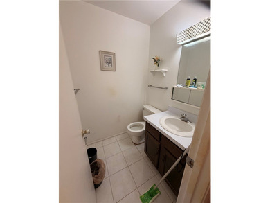 Investor special 1 bed, 1 bath, 1 half bath unit with strong on The American Golf Club in Florida - for sale on GolfHomes.com, golf home, golf lot