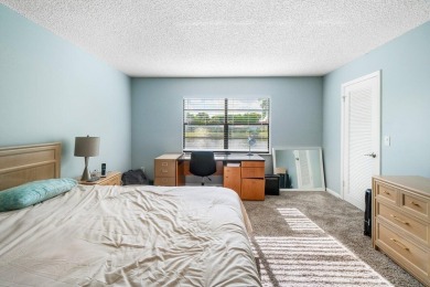 FULLY UPGRADED WATERFRONT FIRST FLOOR UNIT IN SOUGHT AFTER on Boca Lago Golf and Country Club in Florida - for sale on GolfHomes.com, golf home, golf lot