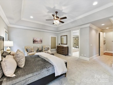 Discover the epitome of luxury living in this stunning executive on Ballantyne Resort and Country Club in North Carolina - for sale on GolfHomes.com, golf home, golf lot